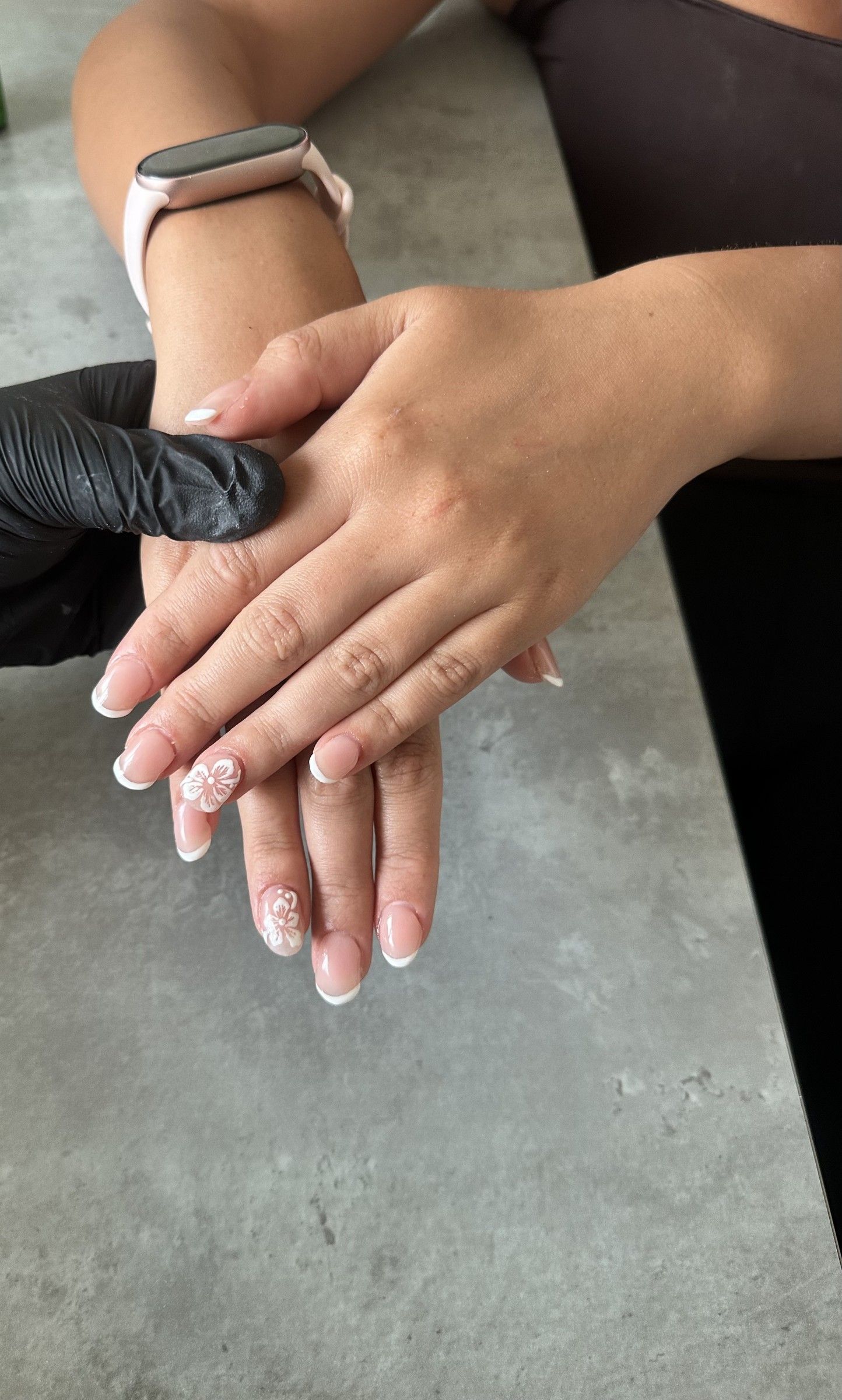 Short acrylic French set with flower accents